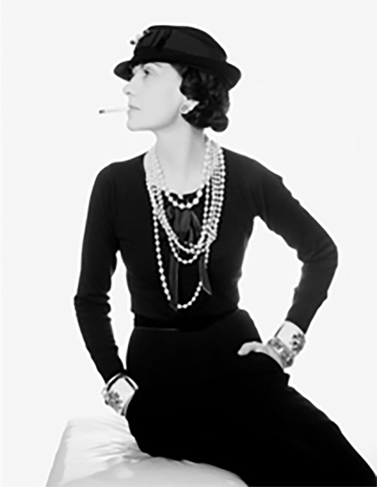 From the Margins to the Core of Haute Couture: The Entrepreneurial Journey  of Coco Chanel, Enterprise & Society