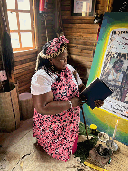 Photograph of Makhosi Vulamasango Isis Nozipho Mutwa, the daughter of Credo Mutwa, in traditional African dress.
