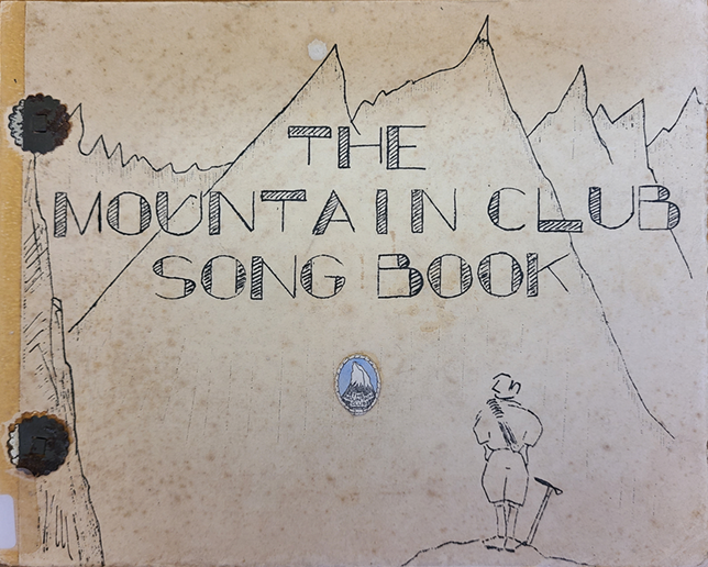 A songbook cover with a hand-drawn black and white cartoon of a mountaineer in the foreground facing a range of tall mountains. See long description.