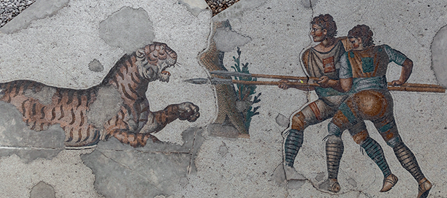 A scene from the peristyle depicting members of the factions hunting a huge tiger. The hunters feature the colours of the Green and Red factions.