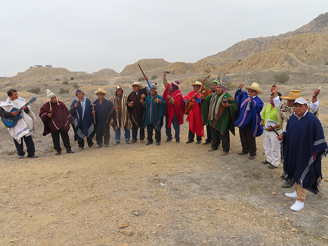 A group of shamans gathered at the Túcume site, possibly preparing for a ritual.