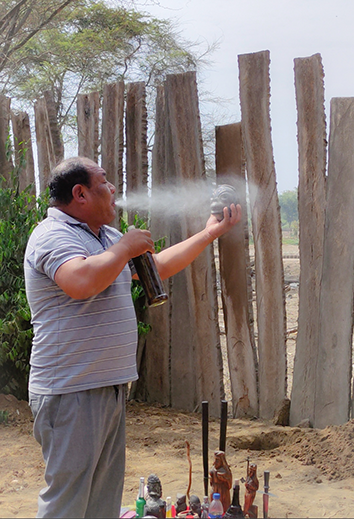 Don José Jesús conducting a ritual during the pago a la huaca ceremony.