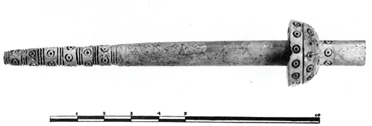 A photograph of a spindle with a hemispherical whorl, found almost intact, from Perati, Attica. See long description.