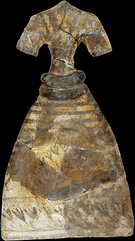 A photograph of a faience object from Knossos. See long description.