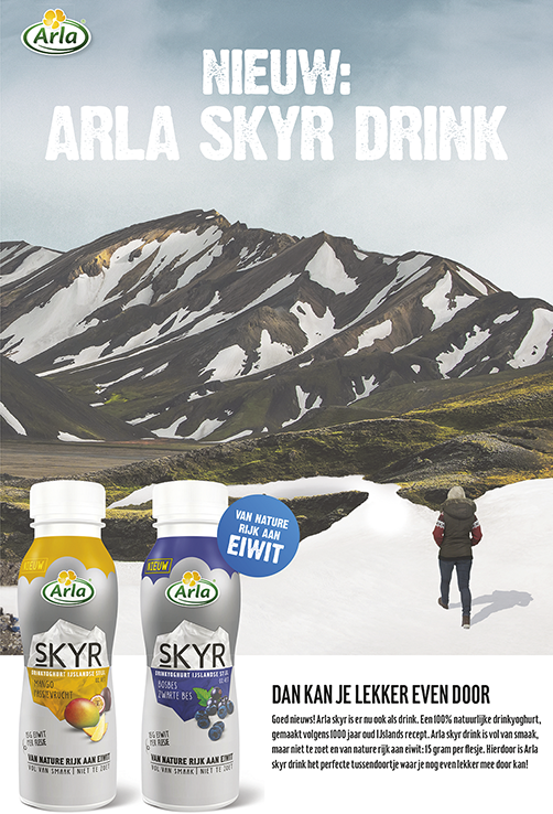 An advertisement showing a woman walking outdoors in a mountain terrain. The add copy promotes Arla’s new skyr drink.