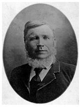 Portrait of Knut Strand, taken in the late 1800s. Seated in a posed studio photograph, wearing formal 19th-century clothing and looking directly at the camera.
