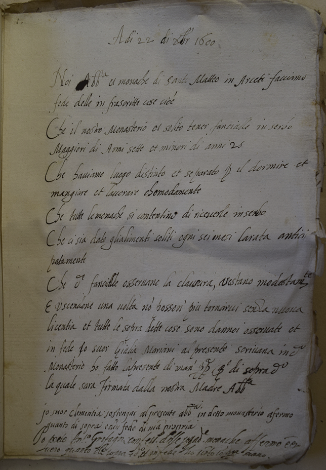 A 16th-century document filled with writing, in three different hands. See long description.