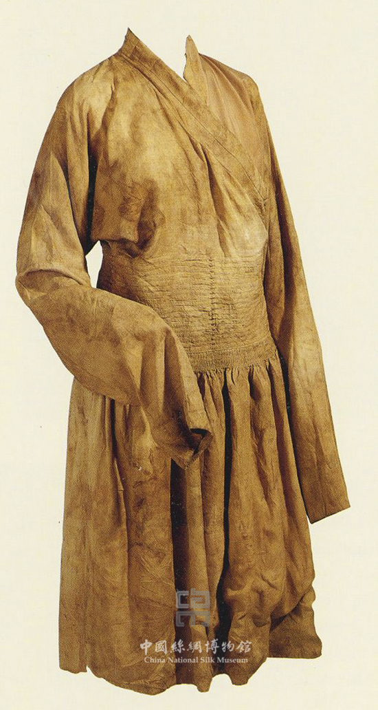 Photo of a long-sleeved, brown silk robe with a wrapped front, fitted waist, and pleated skirt, typical of Yuan Dynasty attire.