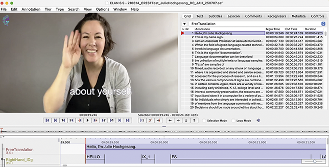 Screenshot of the ELAN file showing video with Julie in the top left. Some tiers are visible on the left. See long description.