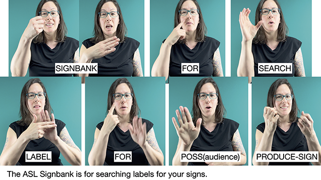 Julie, standing in front of a teal background, signing in A S L. She has medium-length straight brown hair, a black top, and blue glasses. Tattoos on arms. See long description.