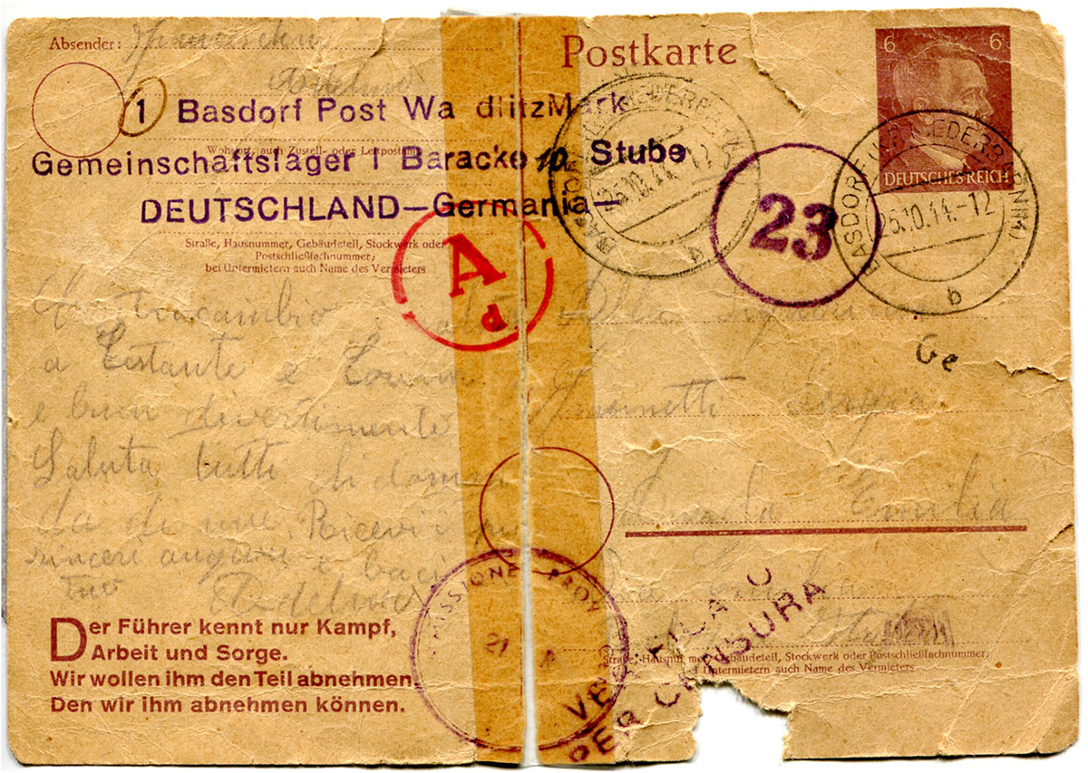 A vintage postcard with German text, stamps and handwritten notes, showing signs of wear and tear. See long description.