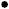 Small solid black square.