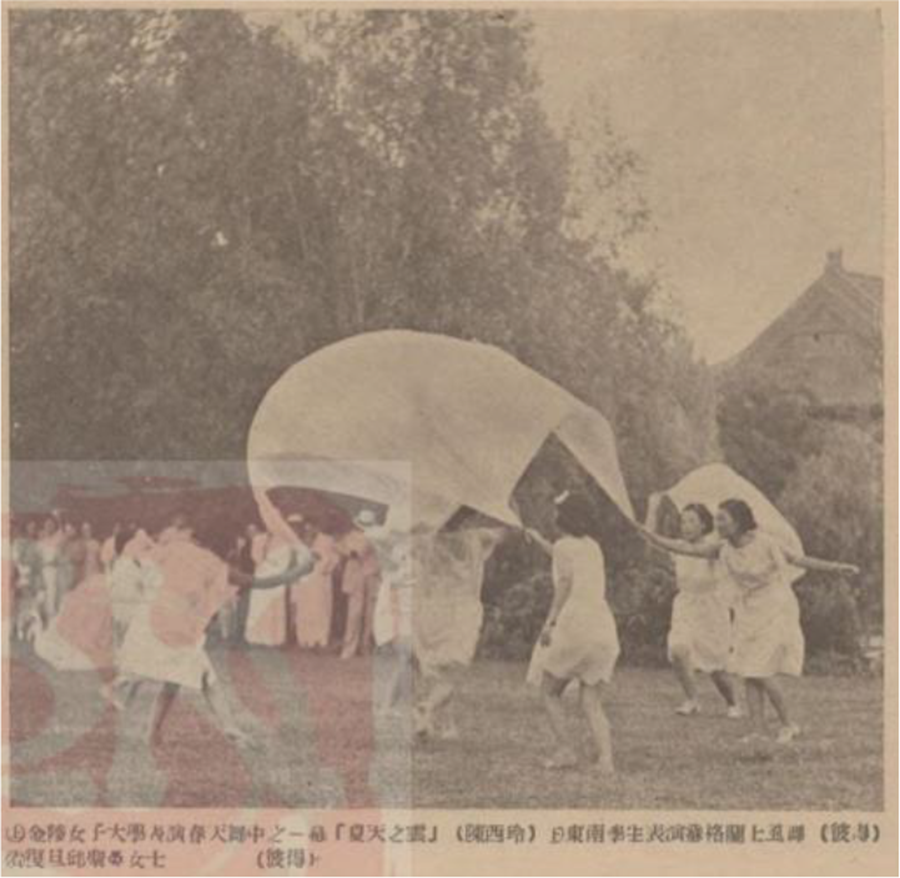 Sepia photo of students in light dresses performing a coordinated outdoor dance with large fabric props, with an audience and trees in the background. See long description.