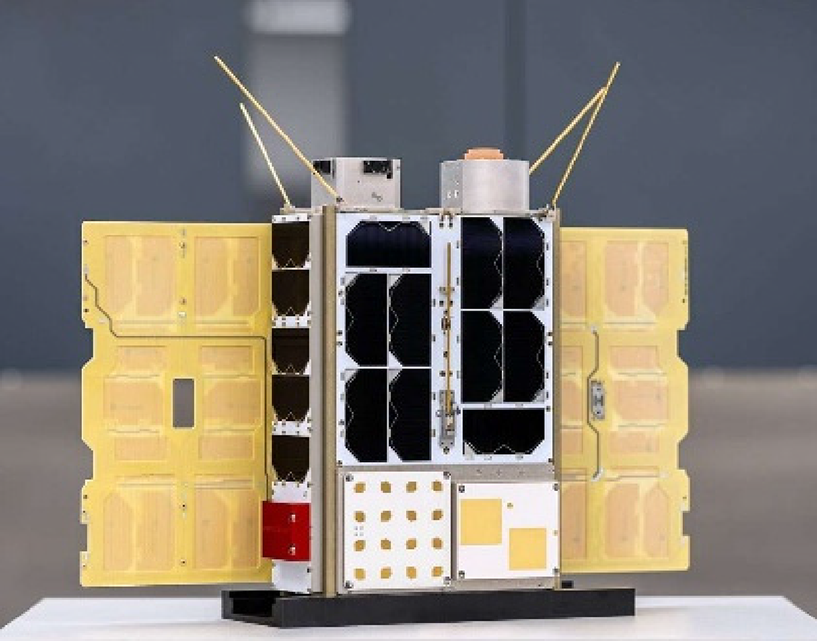 A satellite with solar panels and antennas.