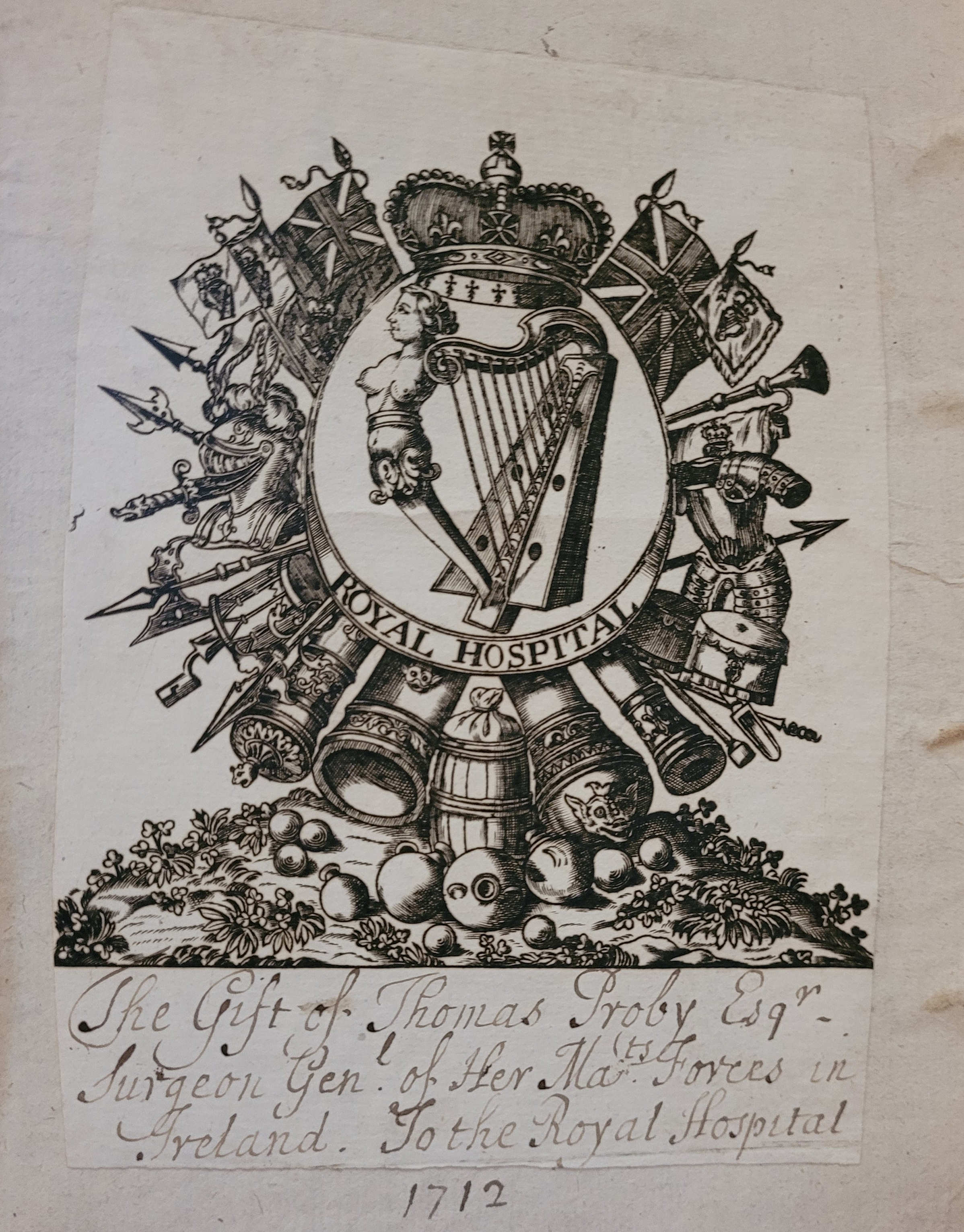 A bookplate featuring a coat of arms with a harp and various military symbols.