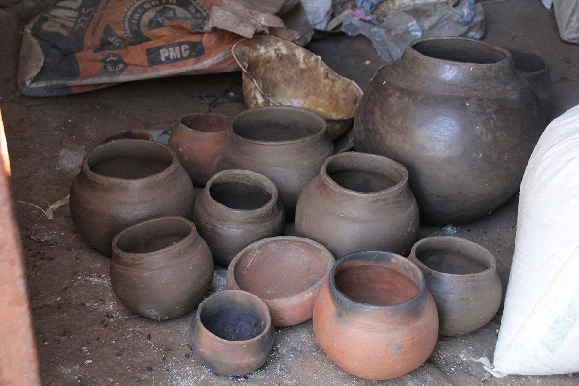 A collection of clay pots of various sizes and shapes.